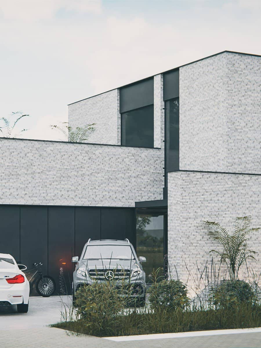 nieuwbouw villa in Aalst in gevelsteen met aluminium zwarte vlakken